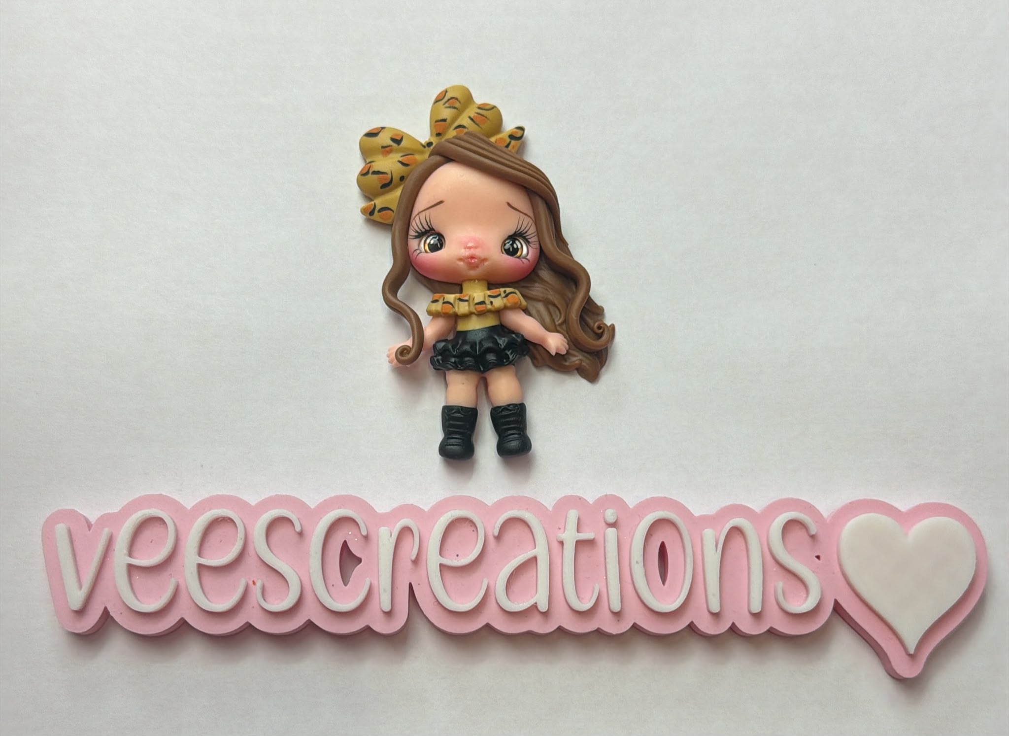 #26 Cheetah Girl Clay Doll
